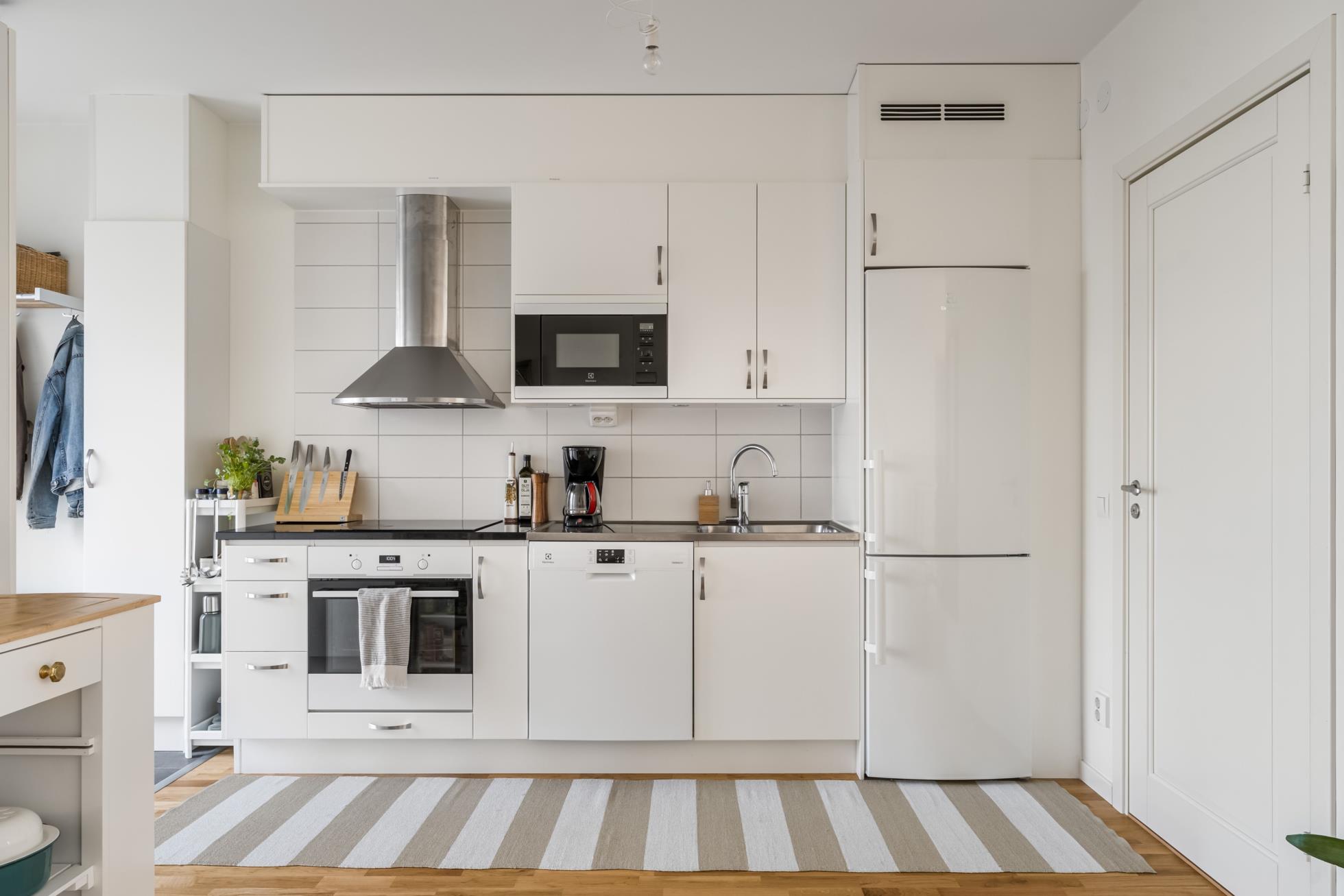 Dubbla balkonger, öppna ytor och hög komfort – högst upp i huset!